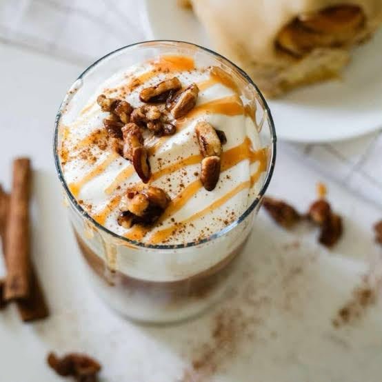 Beyond Ice: How Creamy Cold Foams Are Redefining Hot-Weather Coffee 3 Cream cheese cold foam topped with toasted pecans.